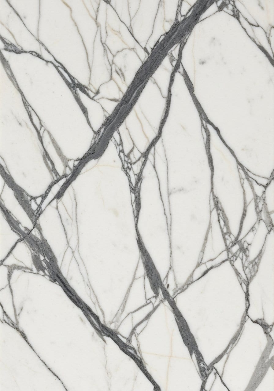 Calacatta marble-effect porcelain stoneware slab with delicate organic dark-grey veining on a crisp white field